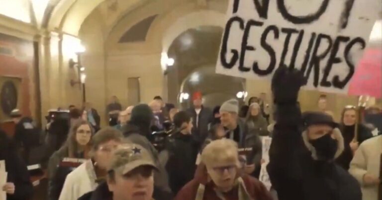 Protesters gathered outside Governor Tim Walz's office at the Minnesota Capitol
