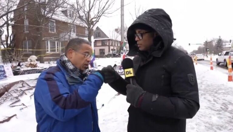 Attorney General Keith Ellison speaking at a press event