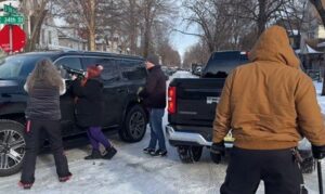 Protester Faces Immediate Consequences for Banging on Federal Agent Window After Minneapolis ICE Self-Defense Shooting