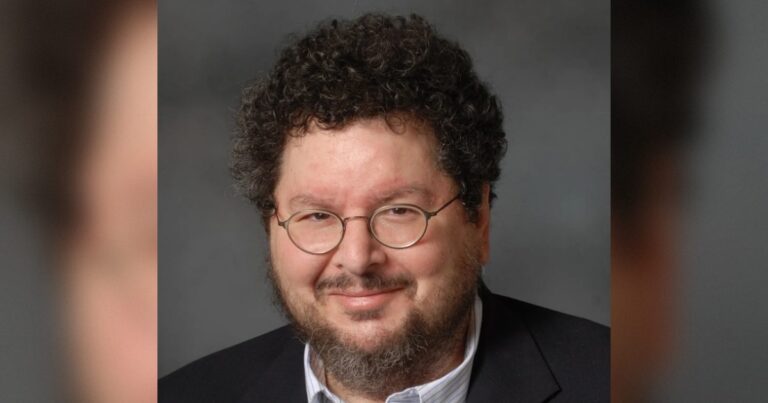 Yale campus gates at dusk