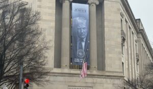 Trump Portrait Towers Over DOJ in Bold Move