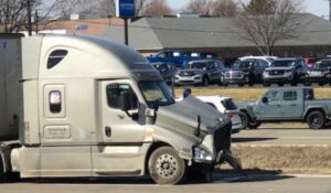 Truck Runs Red Light, Kills 64-Year-Old Man