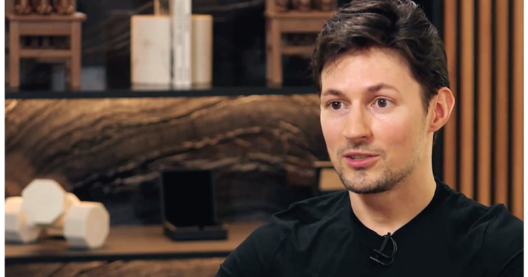 Telegram logo on a smartphone with Russian flag colors reflected