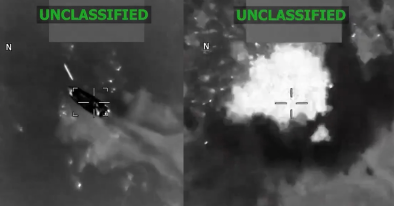 Smoke rising from a small vessel at sea after a strike in the Caribbean