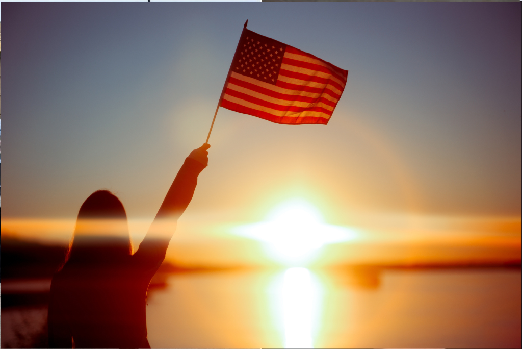 American flag with immigration and citizenship debate imagery