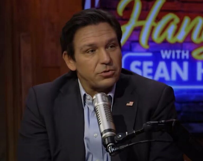 Ron DeSantis speaking during a political event in Florida