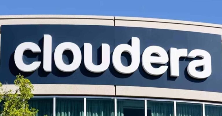 Cloudera company logo displayed prominently on a building exterior against a clear blue sky.