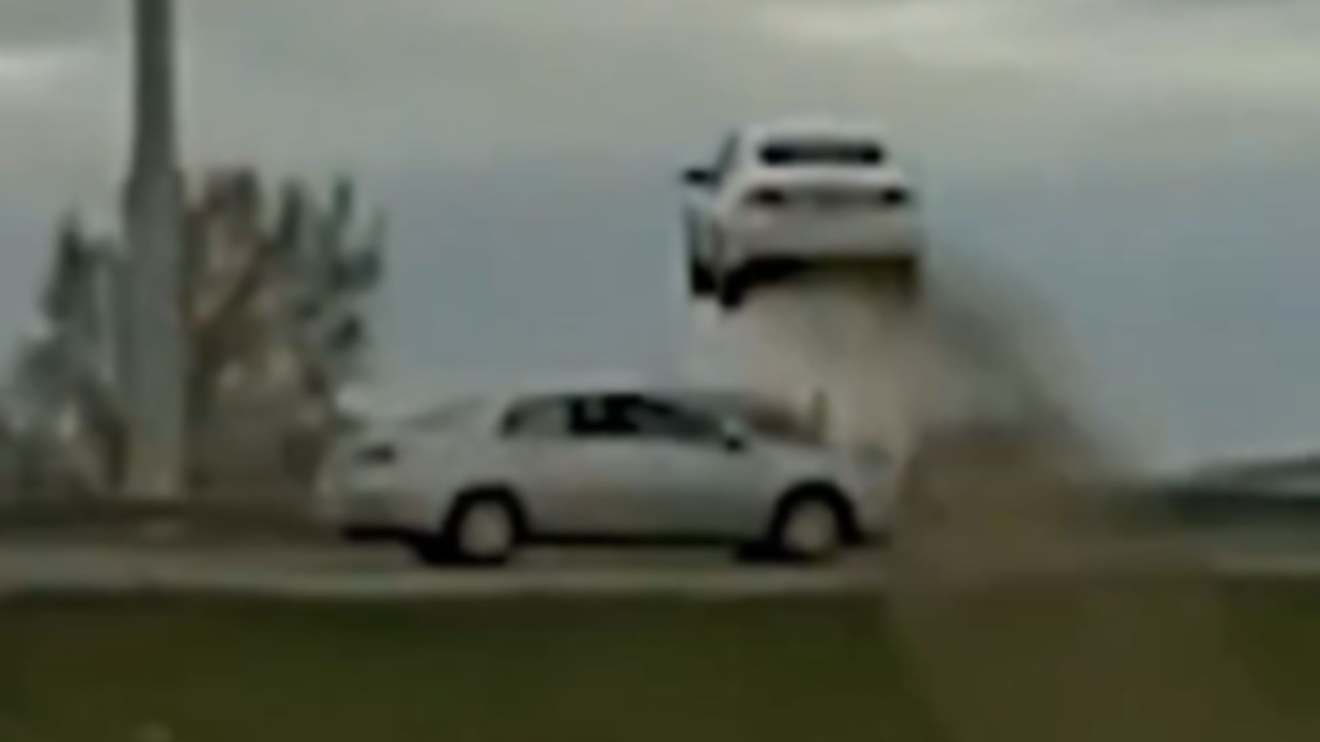 Dashcam footage shows a Wisconsin suspect’s car airborne over highway traffic
