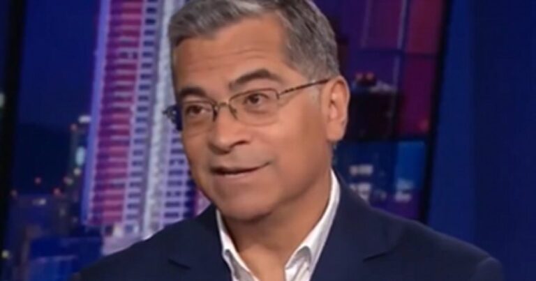 Xavier Becerra speaking during a CNN interview about health care for undocumented immigrants