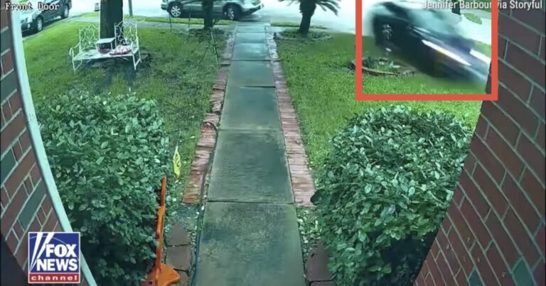 Blue Tesla Model 3 after crashing into a Texas home in Texas.