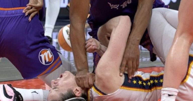 Caitlin Clark on the court during a WNBA game