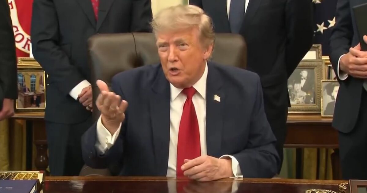 President Trump speaks to reporters during a White House signing event