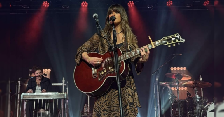 Ella Langley performing on stage during a country music concert