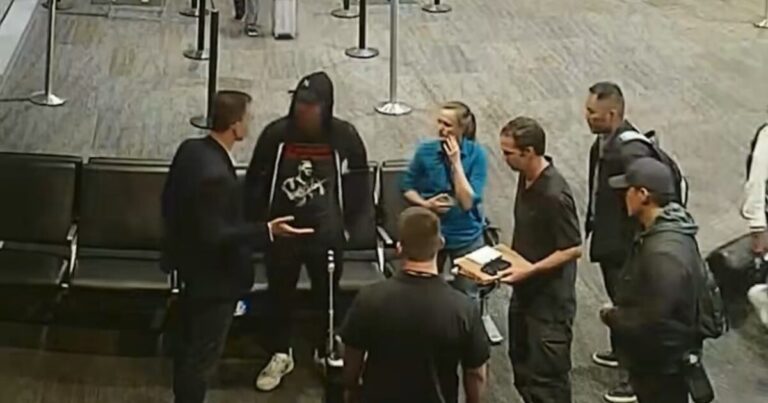 FBI agents approach Eric Swalwell at San Francisco International Airport