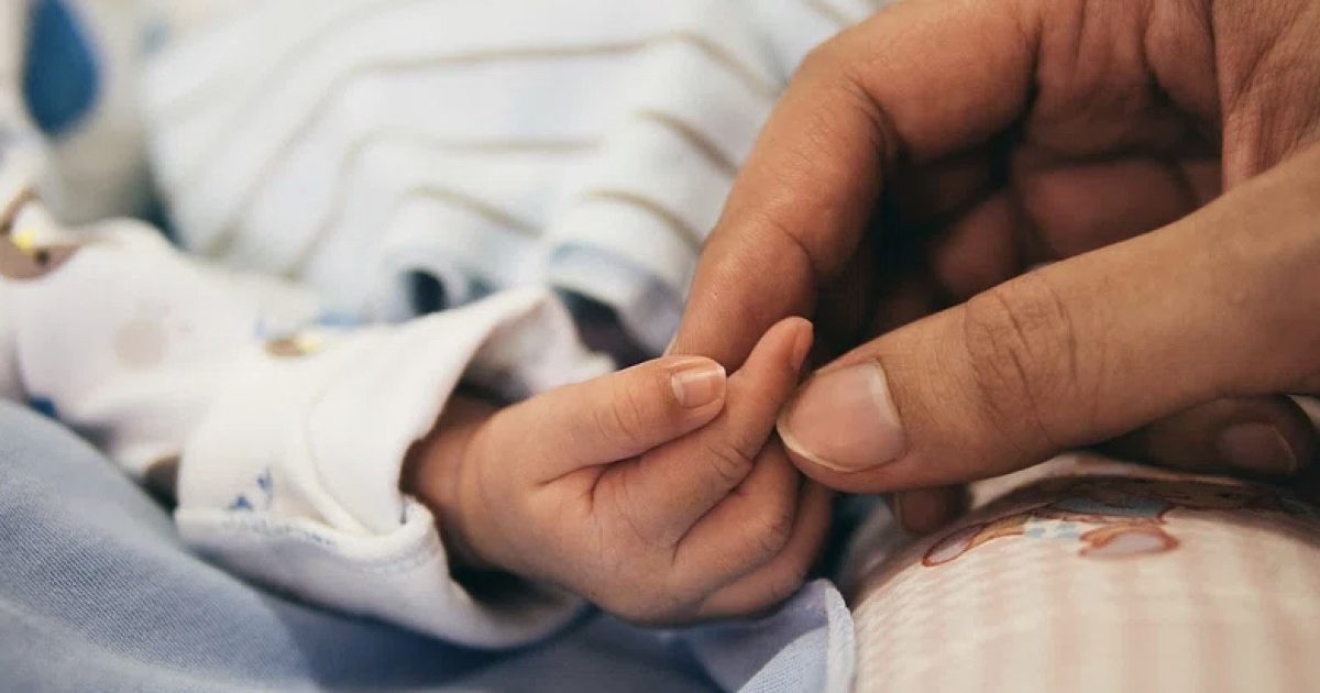 Parent at home with young child as federal child-care policy is debated