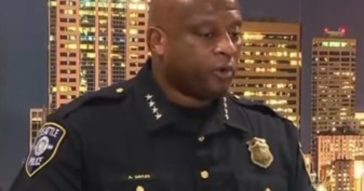 Interim Seattle Police Chief Andre Sayles speaking at a press conference